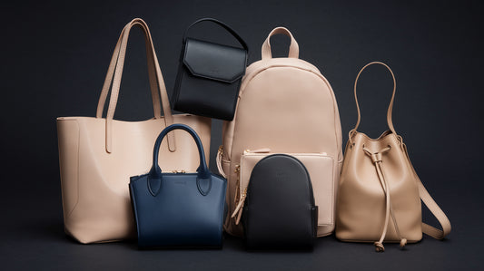 A photo of different types of handbags against a dark background. There is a beige tote bag, a navy blue mini bag, a black crossbody bag, a beige backpack, and a beige bucket bag. The handbags are arranged in a semi-circle.